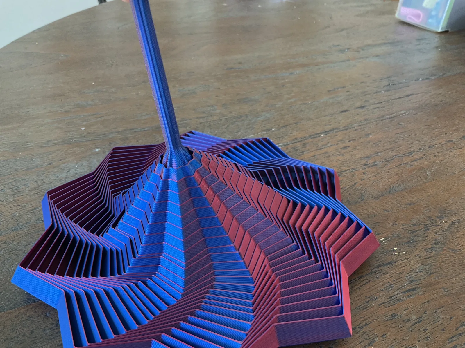 Fidget Star opened wide to show its flexible layered structure